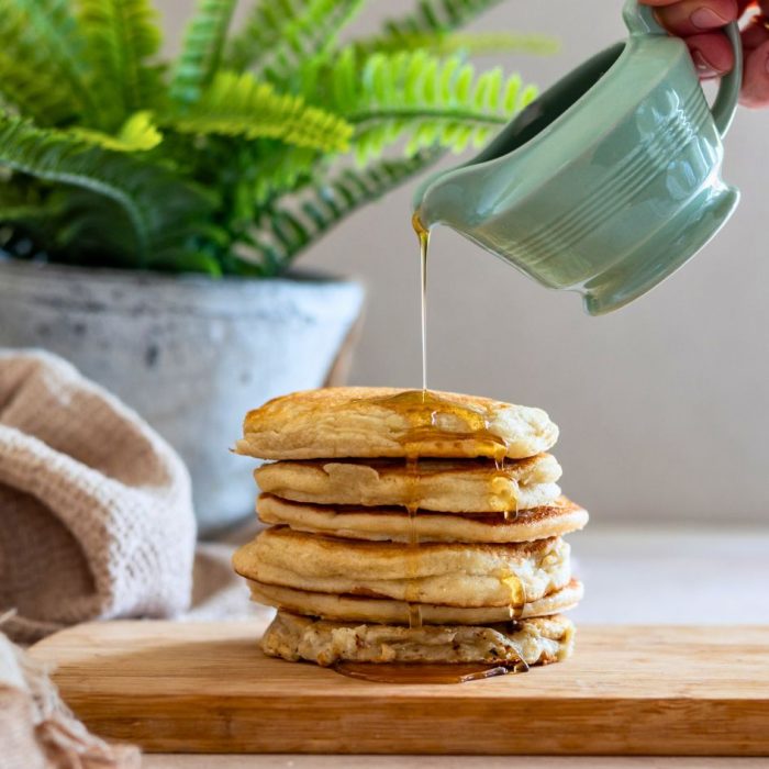 Stack of classic American style pancakes with maple syrup