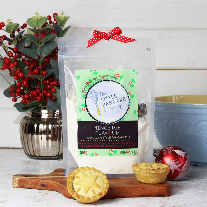 Mince pie flavour festive pancke mix with mince pies and christmas decorations