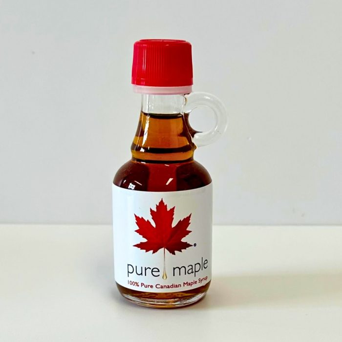 miniature bottle of pure maple syrup