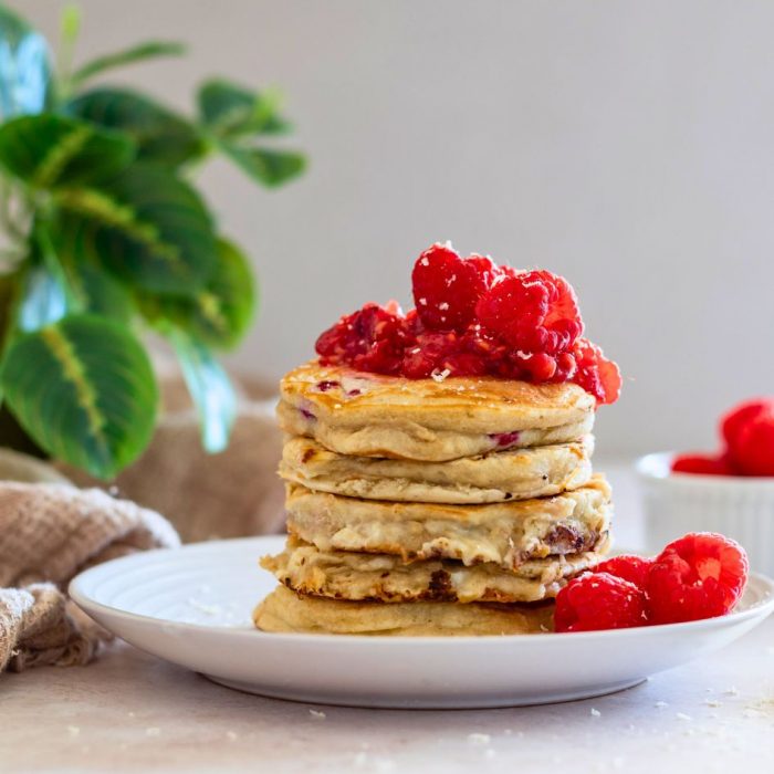 stack of raspberry and white chocolate pancakes