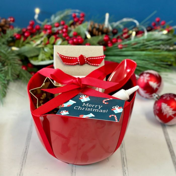 Christmas baking set with red bowl wrapped with ribbon